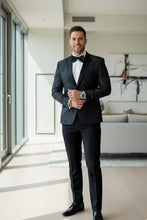 Amsterdam peak-lapel tuxedo jacket, black, 1-button, vented sleeves with interior lining and interior pockets.